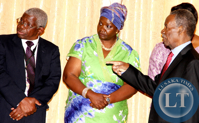 FILE: Anne Sinyangwe (C) and State House Principal Private Secretary Francis Chalabesa shortly before the swearing-in-ceremony at Zambia's Ambassador to Russia Solomon Mbuzi at State House on 6th June 2014