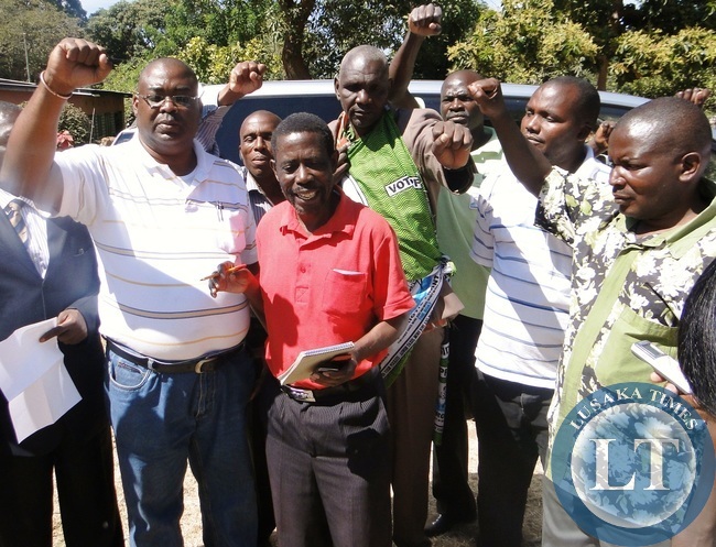 PF Northern Province acting chairperson Peter Mwansa (red) franked by Kasama District Chairman Caleb Monta offering solidarity to PF secretary general Wynter Kabimba at their party office in Kasama PF Northern Province acting chairperson Peter Mwansa (red) franked by Kasama District Chairman Caleb Monta offering solidarity to PF secretary general Wynter Kabimba at their party office in Kasama