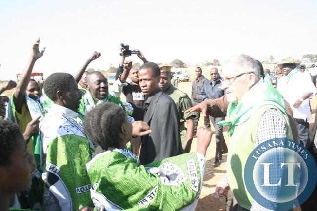 PF Members welcome Vice President Dr. Guy Scott (r) at arrival at Kaoma air strip to drum up support ahead of the forthcoming Mangango August 19 2014, Parliamentary bye elections in Kaoma District, Western Province