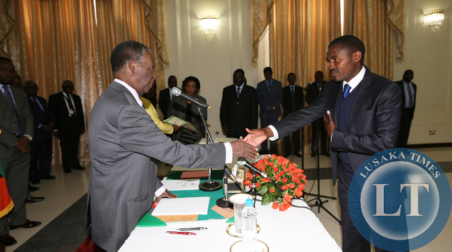 President Sata swearing in Abraham Mwansa -0084 President Michael Sata during the Swearing in Mr Abraham Mwansa as Solicitor General at State house on Wednesday 30th July 2014- Picture by Eddie Mwanaleza.