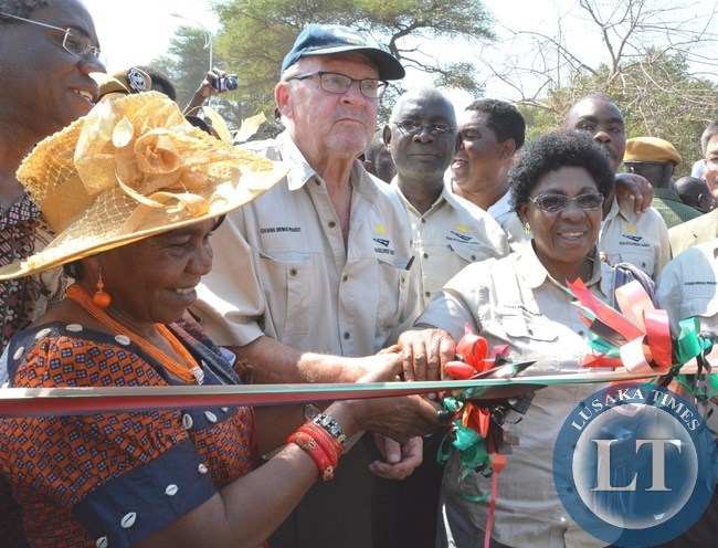 Chieftness Chiawa (r) Senior Chieftness Komesha Mukamambo ii (l) and Vice President Dr. Guy Scott cutting the ribbon during the Official Opening of Michael Chilufya Sata Bridge in Chiawa crossing the Kafue river. Chieftness Chiawa (r) Senior Chieftness Komesha Mukamambo ii (l) and Vice President Dr. Guy Scott cutting the ribbon during the Official Opening of Michael Chilufya Sata Bridge in Chiawa crossing the Kafue river.