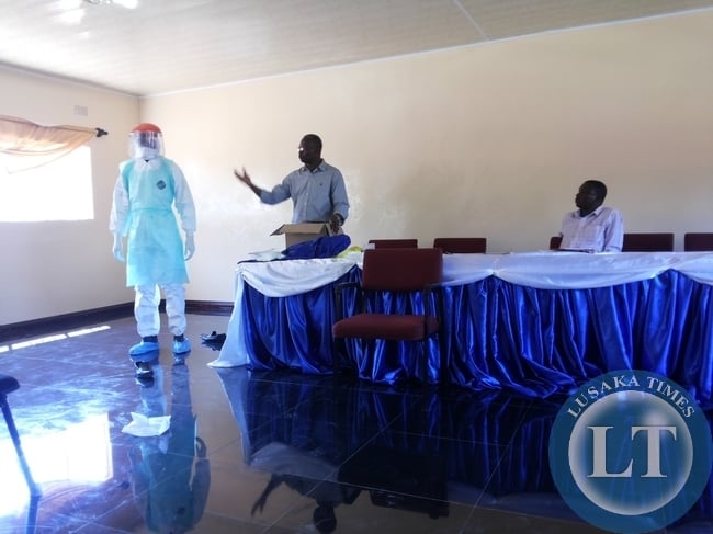 Some medical staff at Livingstone General Hospital in protective clothing preparing to screen delegates coming from West Africa against Ebola Some medical staff at Livingstone General Hospital in protective clothing preparing to screen delegates coming from West Africa against Ebola