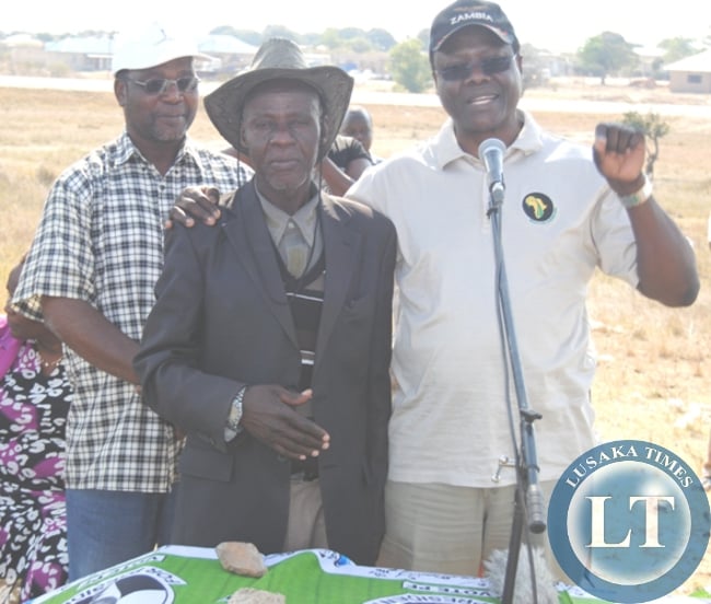HOME Affairs Minister Ngosa Simbyakula (right) with Batoka Ward Patriotic Front (PF) aspiring candidate Maxon Simwami and campaign manager Syacheye Madyenkuku during a campaign rally to drum up support for Mr Simwami in Choma