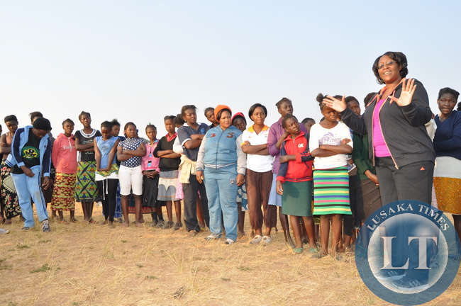 First Lady Dr Christine Kaseba with Pupils after the Physical education Session at the just ended First Lady's Mentorship training of Teachers/ Community Leaders and Pupils at Chinsali Girls Secondary school grounds on August 15, 2014 -Picture by THOMAS NSAMA