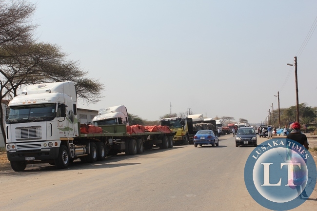 Above, trucks from Democratic Republic of Congo (DRC) heading to South Africa mostly carrying copper are stranded at Kazungula border post in Southern Proviince as authorities from Botswana site are not allowing due to enter their country fears of Ebola in DRC. Some drivers are now planning to back to Livingstone and try to use the Victoria Falls border post on the Zimbabwe route to South Africa