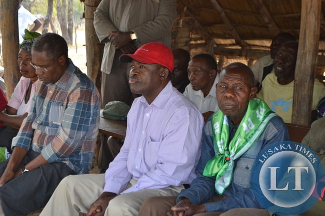 Justice Minister Wynter Kabimba and his counterpart at Local Government Emmanuel Chenda as well as PF candidate in the Mangango by-election Lyambai Lingweshi listen to speakers at a rally at Namalazi Community School.