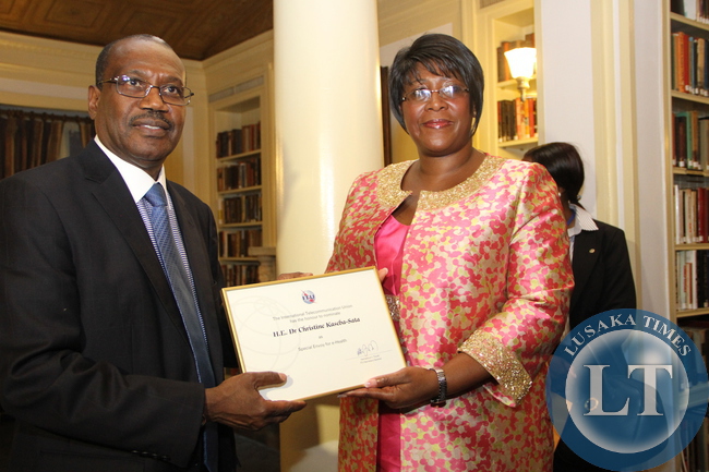 First Lady Dr Christine Kaseba with the International Telecommunication Union Secretary General Dr Hamadoun Toure at Yale Club Library where she was inaugurated as the ITU special Envoy for e-Health. This was on the sidelines of the 69th UN General Assembly in New York on September 21,2014 –Picture by THOMAS NSAMA