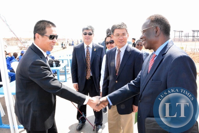 Kingpharm Zambia Shunxue Wang welcoming Minister of Health Joseph Kasonde whilst Chinese Ambassador to Zambia Yang Yaoming (second from right) and Zambia -China Economic and Trade Cooperation Zone General Manager Zan Baosen (Second from left) looks on during the unveiling ceremony of Medical Park at multi facility Economic Zone