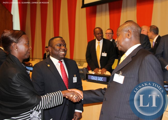 Uganda President Yoweri Museveni talking to Zambia Foreign Minister Harry Kalaba and Rwanda's Foreign Ministers Louise Mushikiwabo at UN Headquarters on Monday 22-09-2014. PHOTO | CHIBAULA D. SILWAMBA | ZAMBIA UN MISSION