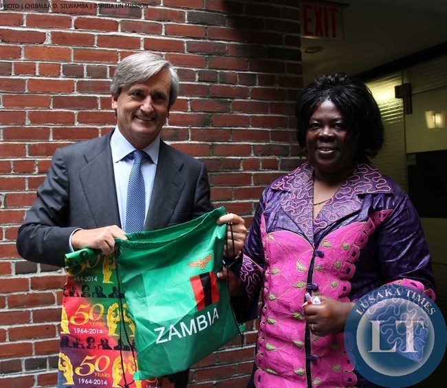 Spain's UN Ambassador Román Oyarzun Marchesi shows off Zambia Golden Jubilee souvenirs he received from Zambia's Minister of Tourism and Arts Jean Kapata (right) in New York on 8-Sept-2014. PHOTO | Chibaula D. Silwamba | Zambia UN Mission
