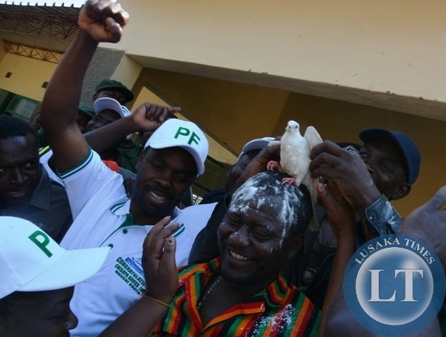 Davis Chisopa being air lifted by party officials to celebrate his victory after scooping the Mkushi south bye election.