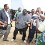 Kasama central member of Parliament Geoffrey Bwalya Mwamba and Kabwata member of parliament Given Lubinda and Sports minister Chishimba Kambwili dancing during a rally to drum up support for  Solwezi PF parliamentary candidate Newton Malwa  on September 10 ,2014 -Picture by THOMAS NSAMA