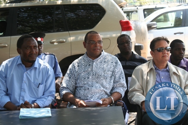 Western Province Minister Richwell Siamunene (l), World Bank Group Executive Director Dr. Denny Kalyalya (c) and World Bank Group Alternate Executive Director Dr. Peter Louis Larose (r) follow proceedings during the visit of the Zambia Strengthening Climate Resilience Project in the Barotse Sub-Basin at the 20 kilometre Natonga Canal in Imalyo area of Mongu District, Western Province