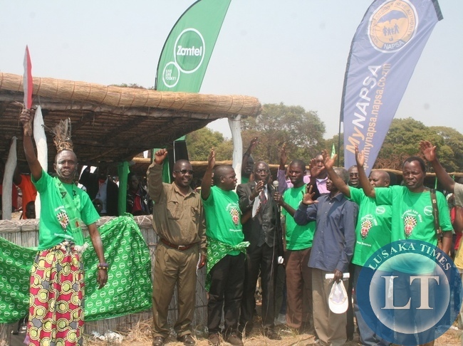 SENIOR chief Ndungu's protector traditionally known as Chipata (with a sword) with other luvales with raised right hands singing the luvale national anthem locally known as Pokoyakayombo ka kutemba during the commemoration of this year's likumbi lya mize traditional ceremony on Saturday in Zambezi