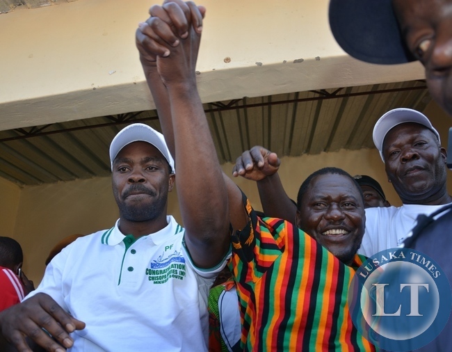 PHILIP KOSAMU AND DAVIS CHISOPA VICTORY Campaign Manager and Lusaka Province Minister Philip Kosamu introduces Davis Chisopa to the crowd after he emerged victorious in the just ended Mkushi South Bye Election.
