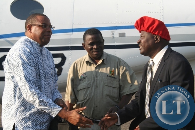 Barotse Royal Establishment (BRE) Induna Inete Akapelwa Silumbu (right) welcomes World Bank Group Executive Director Denny Kalyalya (left) as Western Province Deputy PS Mwangala Liomba looks on at Mongu Airport. The World Bank delegation is visiting the Zambia Strengthening Climate Resilience Project in the Barotse sub-basin in Imalyo area of Mongu in Western Province.