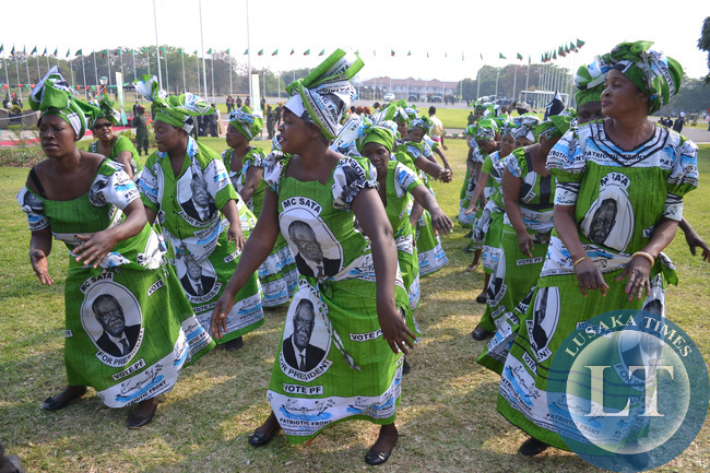 A Patriotic Front choir sings party songs at the official opening of Parliament