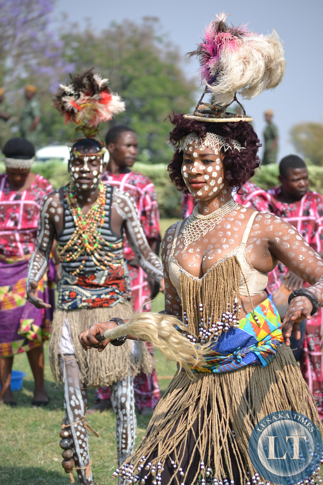 Painted dancers entertain invited guests at Parliament grounds