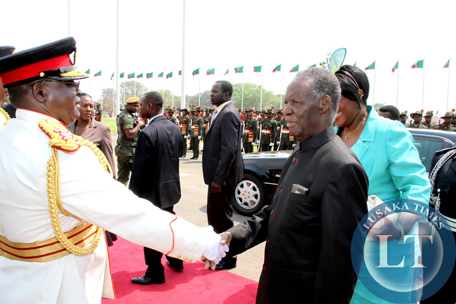 President Sata greets service Chiefs as First Lady Dr Christine Kaseba looks on on arrival at the National Assembly of Zambia for the opening of parliament on September 19, 2014 -Picture by THOMAS NSAMA