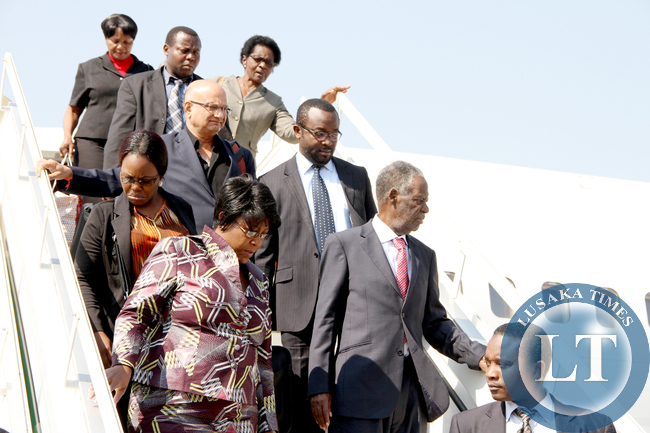 President Sata-Dr Kaseba 1 President Sata and First Lady Dr Christine Kaseba alights from the plane on arrival at Kenneth Kaunda International Airport from New York on sepember 28,2014 -Picture by THOMAS NSAMA