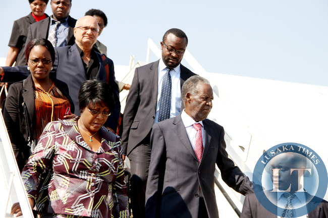 President Sata and First Lady Dr Christine Kaseba alights from the plane on arrival at Kenneth Kaunda International Airport from New York on sepember 28,2014 -Picture by THOMAS NSAMA