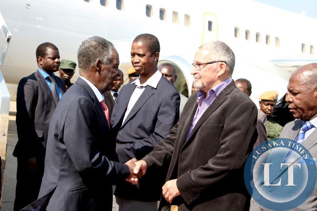 President Sata-Dr Scott 6 President Sata being welcomed by Vice-President Dr Guy Scott on arrival at Kenneth Kaunda International Airport from New York on sepember 28,2014 -Picture by THOMAS NSAMA