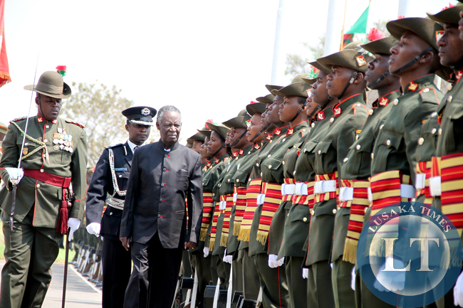 President Sata inspects a guard of honour during the opening of parliament on September 19, 2014 -Picture by THOMAS NSAMA