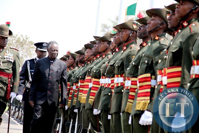 President Sata inspects a guard of honour during the opening of parliament on September 19, 2014 -Picture by THOMAS NSAMA