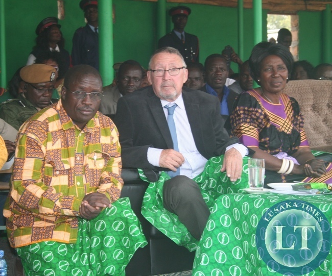 VEEP Dr Guy Scott (m) with Gender minister Inonge Wina (r) and Likumbi lya mize national chairperson Max Mbunji watch the Makishi entering the main arena during this year's Likumbi lya mize traditional ceremony in Zambezi on Saturday in Zambezi