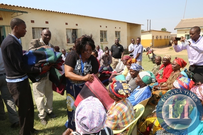 Tourism Minister Jean Kapata donating blankets to the edged at her constituency office in Lusaka