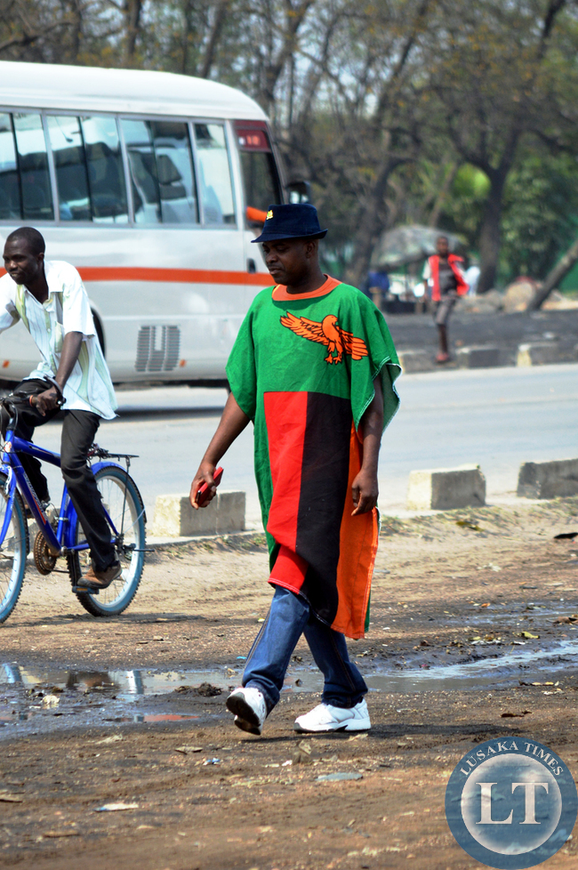 Soccer Fan all dressed up and heading to the stadium