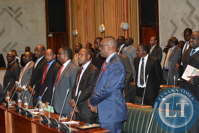 Opposition Members of parliament listens during the presentation of 2015 budget