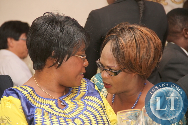 First Lady Dr Christine Sata with chats with Former Zambia's High Commissioner to Kenya Mumbi Phiri during the Golden Jubilee Anniversary of Zambia's Independence and the 50th Anniversary of India -Zambia Diplomatic relations in Lusaka on October 18,2014 -Pictures by THOMAS NSAMA