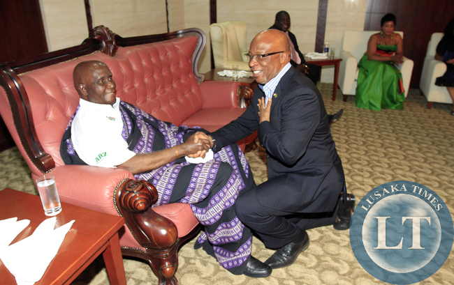 Dr Nevers Mumba greets Dr Kaunda at Jubilee Night at heroes stadium