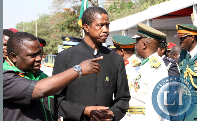 Edgar Lungu Listens to Foreign Affairs minister Harry Kalaba on arrival at Freedom Statue during the Golden Jubilee celebrations in Lusaka on October 24,2014 -Picture by THOMAS NSAMA
