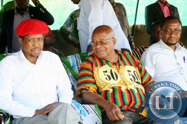 Defense Minister Edgar Lungu (l) who is also PF Secretary General with Southern Province Minister Daniel Munkombwe (c) and Western Province Minister Richwell Siamunene (r) at a PF Rally meeting at Blue Gums in Mongu District of Western Province