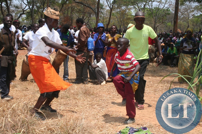 2 year old Ezikyo Kitabamba ( r) from Matebo cultural dance group perform the hunters dance during preserve cultural norms ceremony locally as Kuvuluka Kishaluku ceremony in chief Matebo’s area in Solwezi