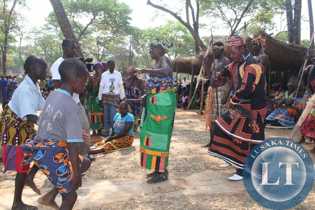 Chief Matebo ( r) of the Kaonde people of Solwezi dancing to the proclaim unity after struggle dance locally known as Kabayenge Kabayenge during Kuvuluka Kishakulu ceremony held in Solwezi