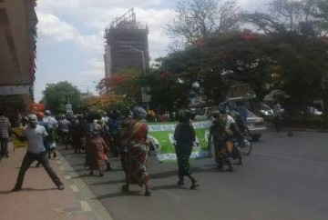 PF cadres matching along Cairo road protesting Dr Scott's appointment