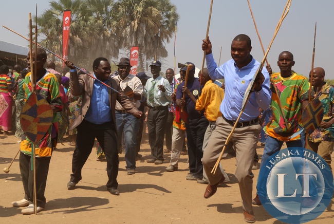 Lusaka Province Minister Philip Kosamu flanked by his Deputy PS Bright Nundwe joins the Tonga dance during the Zambangulwe Traditional Ceremony of His Royal Highness Chief Chipepo of Chirundu
