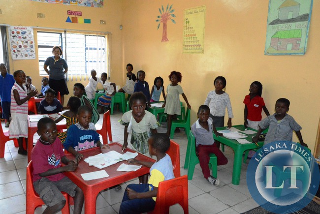 Children in the under 5 class with teacher Jacinta Shimubanga at at Kanyama Service Centre