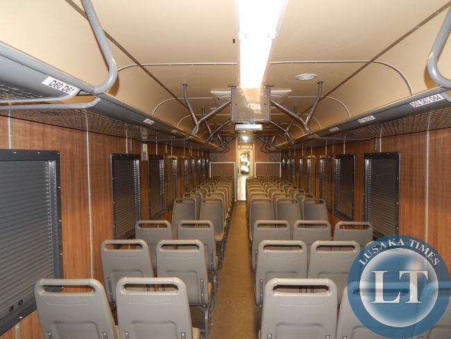 The inside of one of the Economy Class coaches