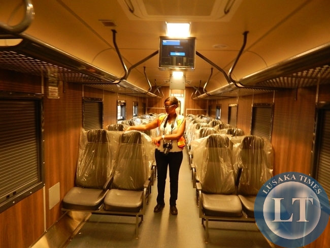 Transnet Engineering Senior Account Executive for Strategy & Marketing Ms. Lynette Mangozhe, inside one of the Standard Class coaches