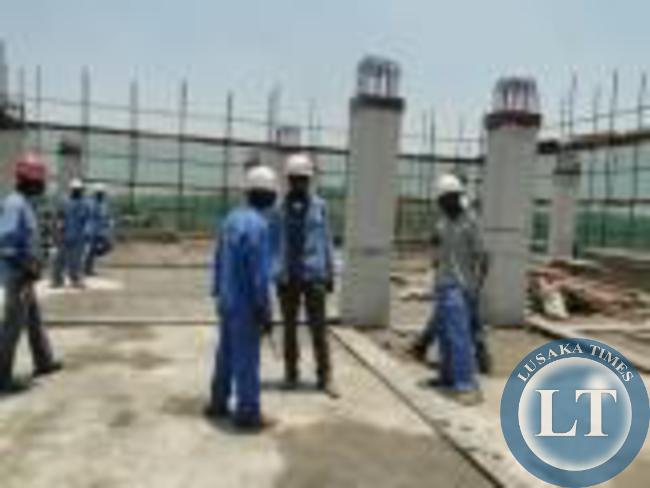 Workers at the Construction site of a six-storey Provincial administration block in Muchinga Province