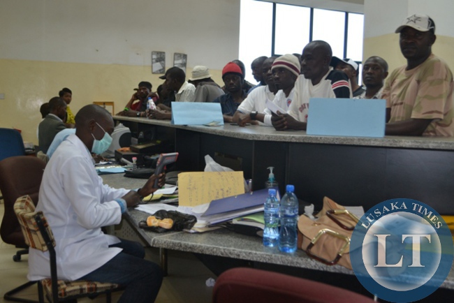 PORT health officer Edwin Kapela screening people entering the country at Kasumbalesa Border Post for Ebola threat