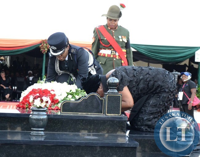 FIRST Lady Christine Kaseba Sata laying wreaths at the grave of the late President Michael Sata during the burial ceremony held at Embassy