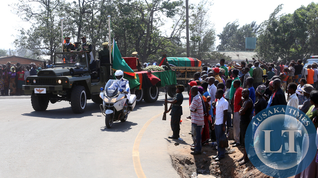 Thousands of Zambian line up the Funeral Cortage of the Late President