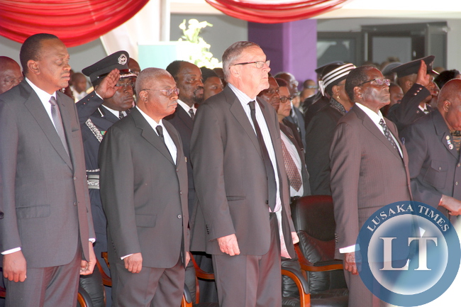 President Uhuru Kenyatta of Kenya ,Mozambique President Armando Guebuza,Acting President Guy Scott and Zimbabbwean president Robert Mugabe