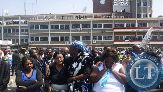 Mourners at the Kennet Kaunda international airport