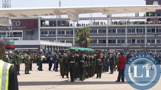 Defence Personnel carrying the casket of President Sata during the arrival ceremony of the body at Kenneth Kaunda International Airport